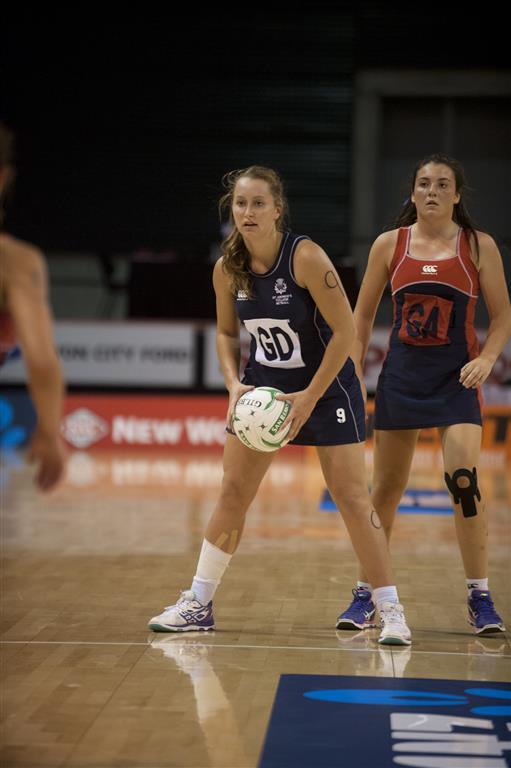 Charlotte Elley playing at the College Netball Champs